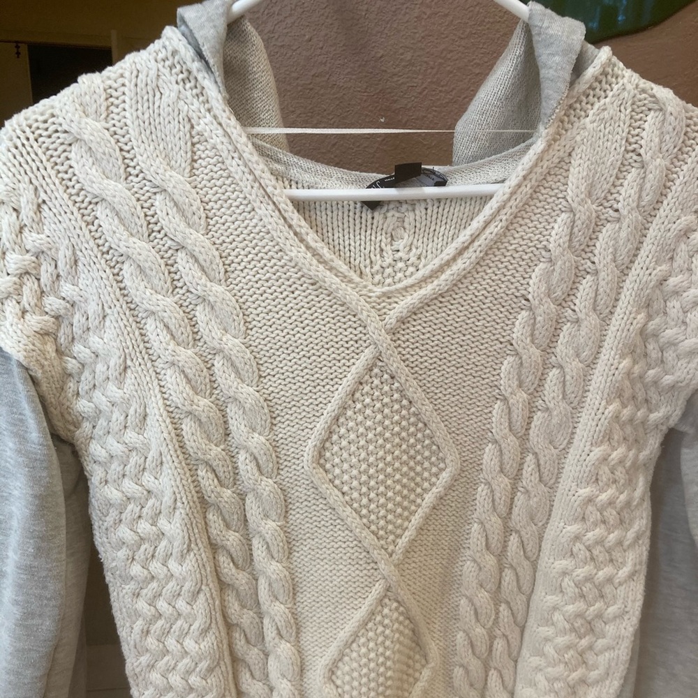 Pullover sweater with cotton arms and hoody.
